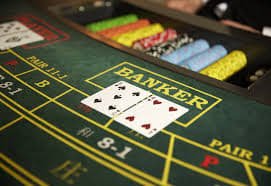 Live dealer blackjack table on mobile phone screen showing card game in progress
